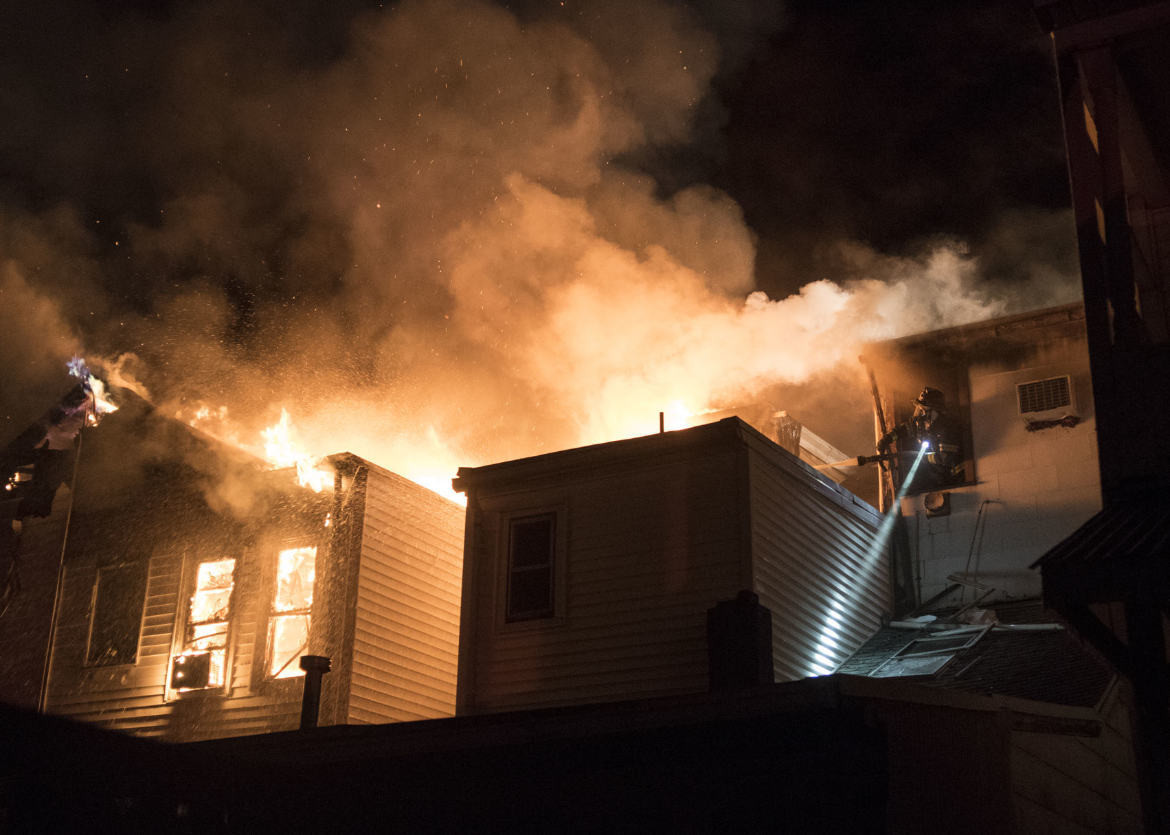 Rekindle of Tuesday's fatal fire presses drained firefighters back into service